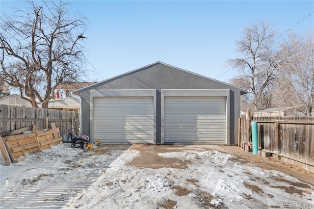 view of snow covered garage