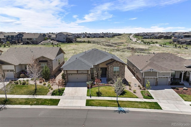 23030 E Del Norte Cir, Aurora, CO 80016 - view of front of house with driveway, a residential view, and brick siding