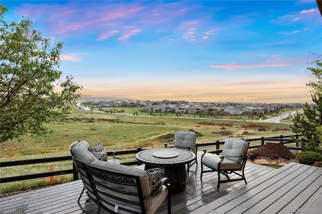 23030 E Del Norte Cir, Aurora, CO 80016 - deck at dusk with an outdoor fire pit