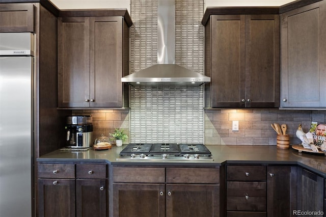 23030 E Del Norte Cir, Aurora, CO 80016 - kitchen featuring wall chimney exhaust hood, stainless steel appliances, and dark brown cabinetry