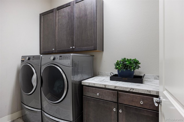 23030 E Del Norte Cir, Aurora, CO 80016 - washroom featuring cabinet space and washer and dryer