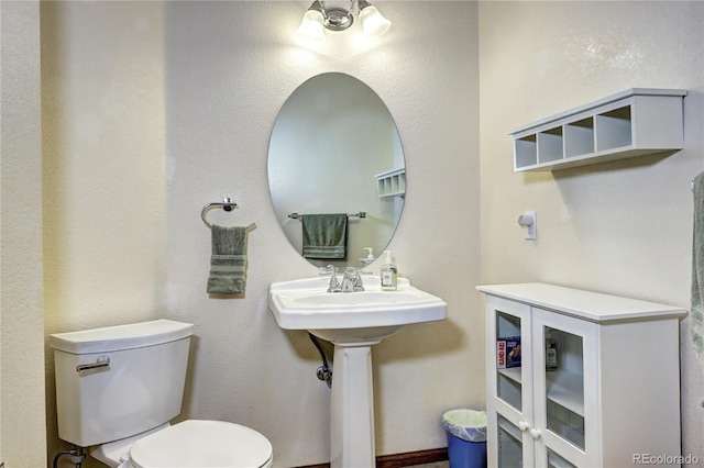 1313 Iris Cir, Broomfield, CO 80020 - bathroom featuring toilet and a sink