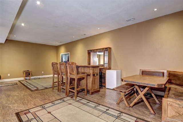 1313 Iris Cir, Broomfield, CO 80020 - dining area featuring light wood finished floors and recessed lighting