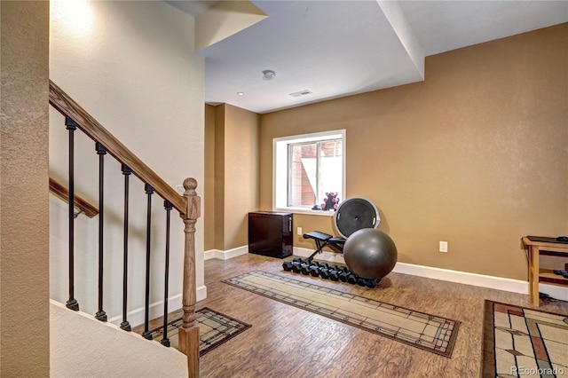 1313 Iris Cir, Broomfield, CO 80020 - workout area featuring wood finished floors and baseboards