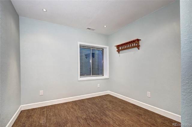1313 Iris Cir, Broomfield, CO 80020 - unfurnished room featuring dark wood finished floors and recessed lighting