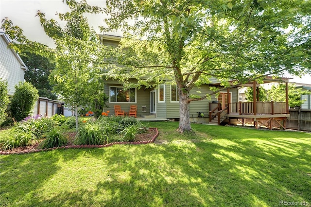 1313 Iris Cir, Broomfield, CO 80020 - back of house featuring a wooden deck and a yard