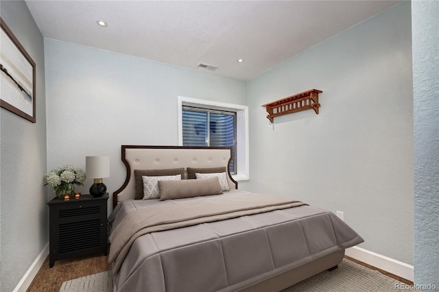 1313 Iris Cir, Broomfield, CO 80020 - bedroom with wood finished floors and recessed lighting