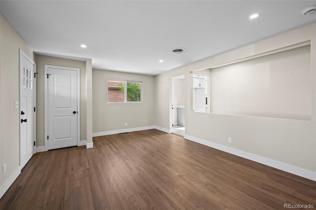 unfurnished living room with recessed lighting, baseboards, visible vents, and wood finished floors