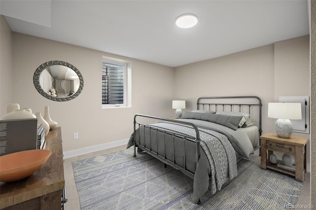 bedroom with baseboards