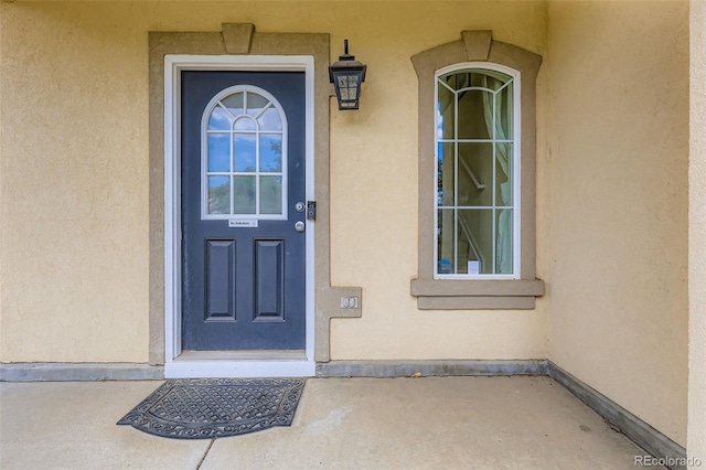 5535 Flanders Way, Denver, CO 80249 - entrance to property with stucco siding