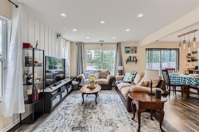 5535 Flanders Way, Denver, CO 80249 - living room with wood finished floors, plenty of natural light, and recessed lighting