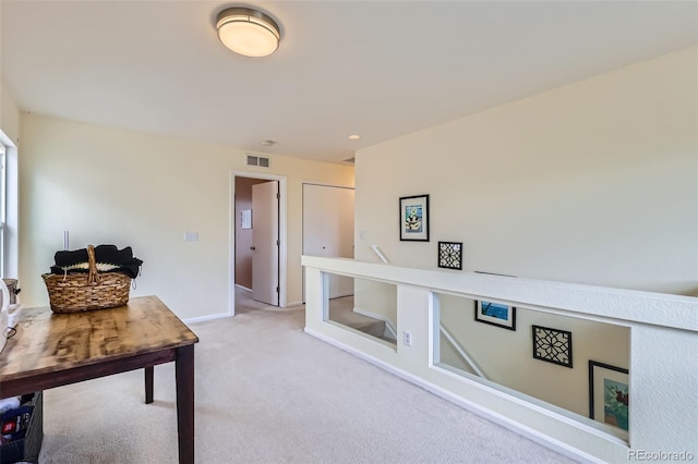 5535 Flanders Way, Denver, CO 80249 - hallway with light colored carpet and baseboards