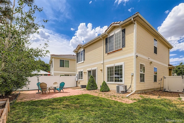 5535 Flanders Way, Denver, CO 80249 - back of property featuring a patio