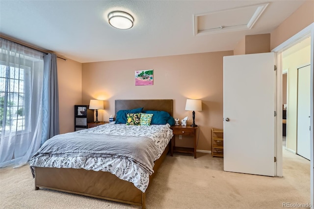 5535 Flanders Way, Denver, CO 80249 - bedroom with attic access and light carpet