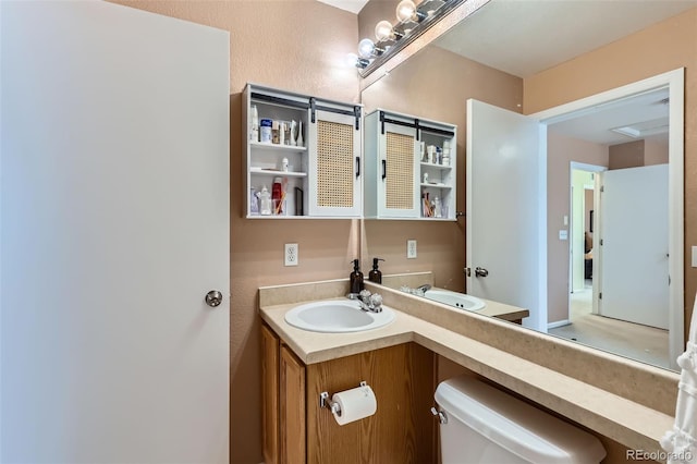 5535 Flanders Way, Denver, CO 80249 - bathroom featuring toilet and vanity