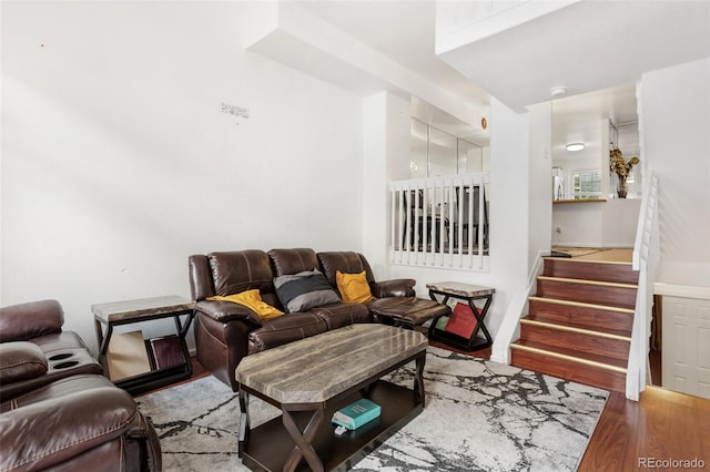 1885 S Quebec Way Unit G104, Denver, CO 80231 - living room featuring wood finished floors and stairway