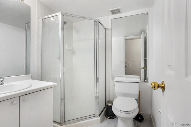 1885 S Quebec Way Unit G104, Denver, CO 80231 - bathroom with vanity, a shower stall, and toilet