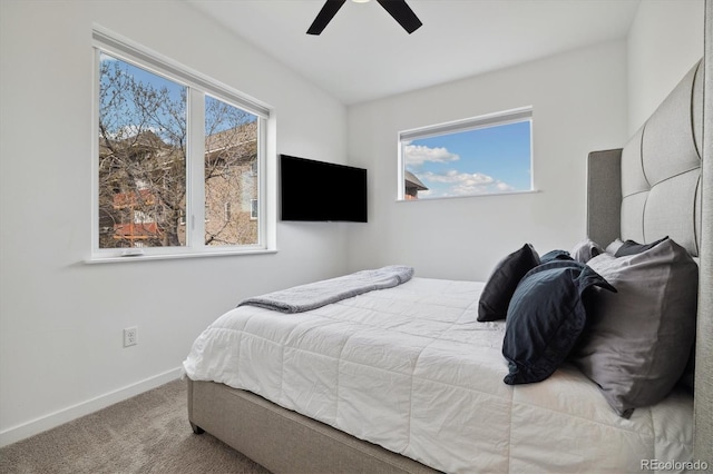 3101 W 47th Ave Unit 14, Denver, CO 80211 - bedroom featuring carpet floors, baseboards, and ceiling fan