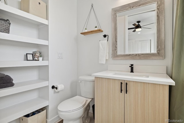 3101 W 47th Ave Unit 14, Denver, CO 80211 - bathroom featuring toilet, vanity, and a ceiling fan