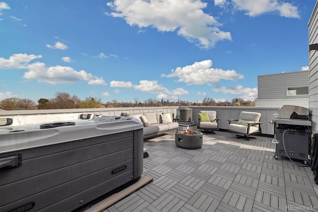 3101 W 47th Ave Unit 14, Denver, CO 80211 - view of patio with an outdoor living space with a fire pit, a hot tub, and area for grilling
