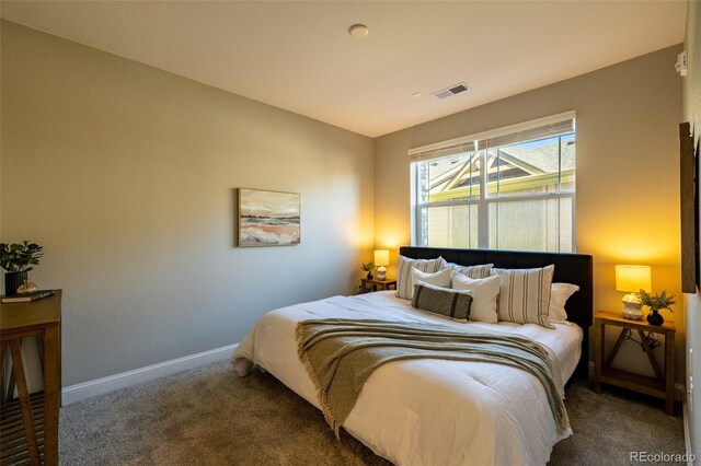 9992 W Victoria Pl Unit 103, Littleton, CO 80127 - bedroom featuring carpet flooring and baseboards