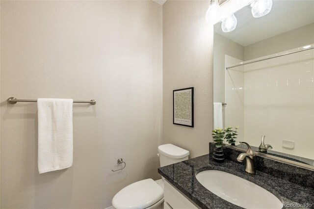 9992 W Victoria Pl Unit 103, Littleton, CO 80127 - bathroom with vanity and a shower