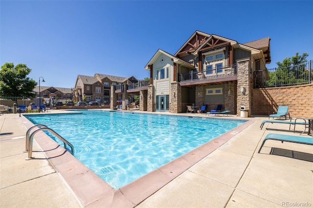 9992 W Victoria Pl Unit 103, Littleton, CO 80127 - community pool with a patio area and a residential view