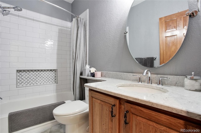 9644 S Estes Way, Littleton, CO 80127 - full bath featuring shower / bath combo with shower curtain, vanity, a textured wall, and marble look tile flooring