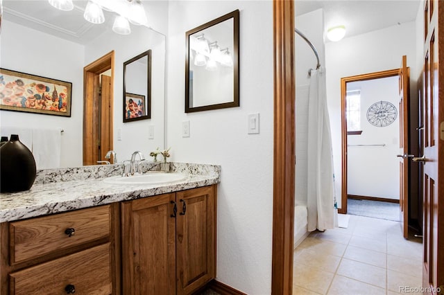 9644 S Estes Way, Littleton, CO 80127 - bathroom featuring vanity and tile patterned flooring