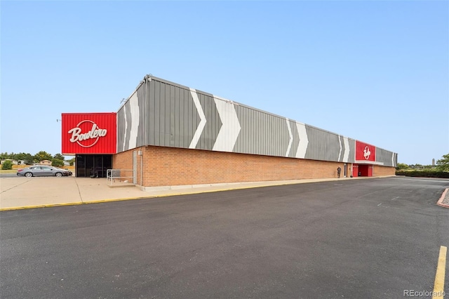 9125 Lowell Ct, Westminster, CO 80031 - view of commercial property with uncovered parking
