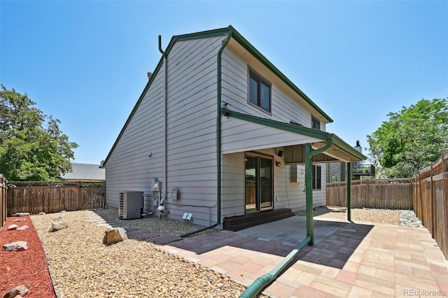 9125 Lowell Ct, Westminster, CO 80031 - back of house with a patio area and a fenced backyard
