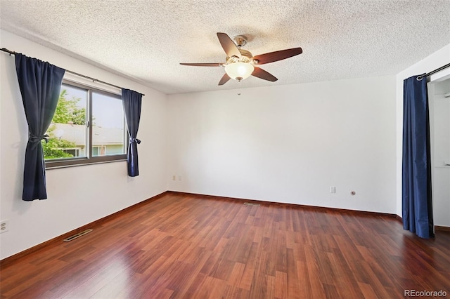 9125 Lowell Ct, Westminster, CO 80031 - spare room featuring a textured ceiling, wood finished floors, and a ceiling fan