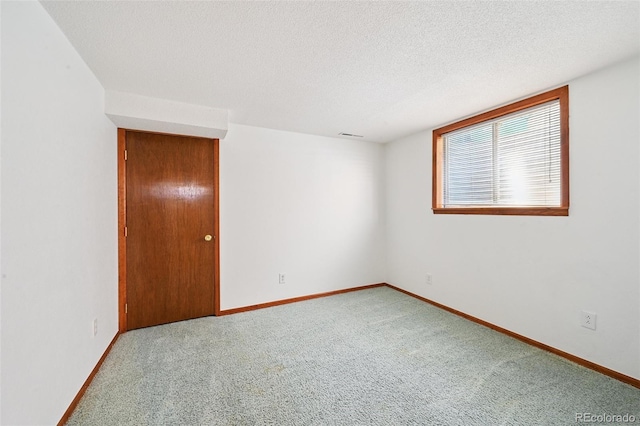 9125 Lowell Ct, Westminster, CO 80031 - empty room featuring carpet floors and a textured ceiling