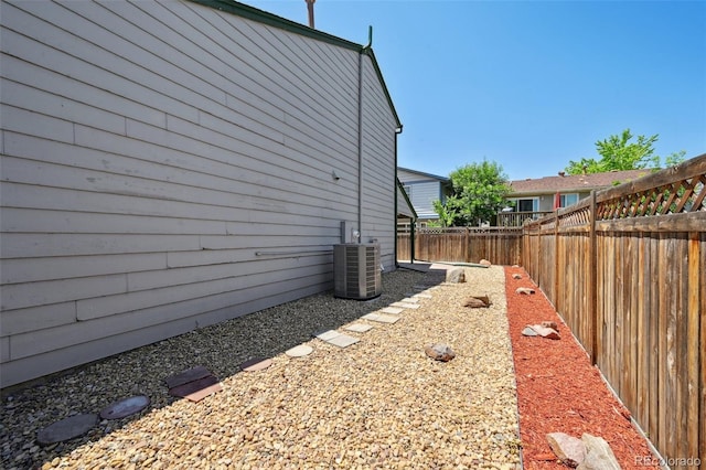 9125 Lowell Ct, Westminster, CO 80031 - view of property exterior featuring a cooling unit and a fenced backyard