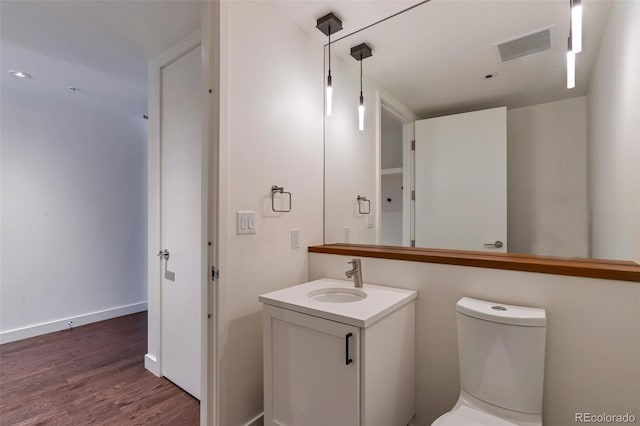 1750 Wewatta St Unit 1102, Denver, CO 80202 - bathroom featuring vanity and wood finished floors