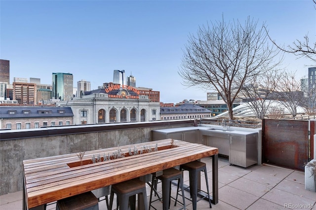 1750 Wewatta St Unit 1102, Denver, CO 80202 - patio / terrace with a city view and outdoor dining area