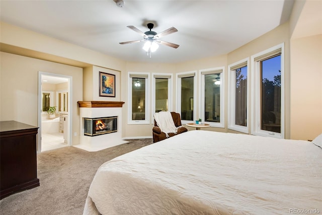 9980 Newton Ct, Westminster, CO 80031 - bedroom with ensuite bathroom, carpet, ceiling fan, a glass covered fireplace, and access to exterior