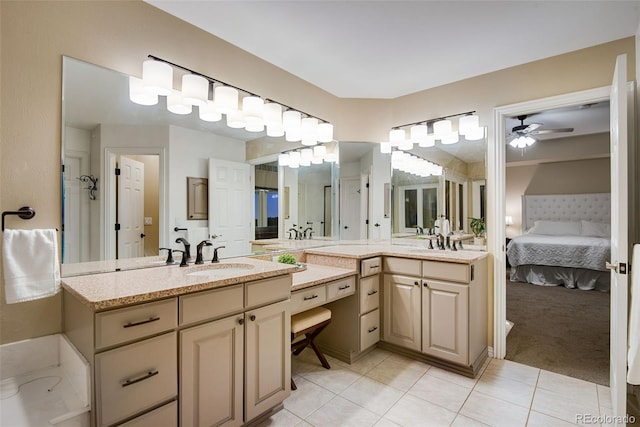 9980 Newton Ct, Westminster, CO 80031 - bathroom featuring a ceiling fan, ensuite bathroom, tile patterned floors, and vanity