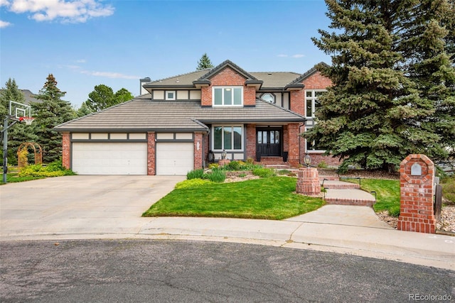 9980 Newton Ct, Westminster, CO 80031 - craftsman house with a garage, a tiled roof, concrete driveway, a front yard, and brick siding