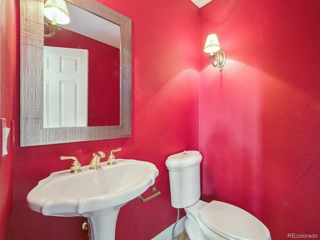 902 Anaconda Ct, Castle Rock, CO 80108 - half bathroom with a sink and toilet
