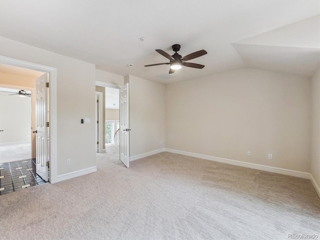 902 Anaconda Ct, Castle Rock, CO 80108 - unfurnished bedroom featuring vaulted ceiling, baseboards, ceiling fan, and carpet floors