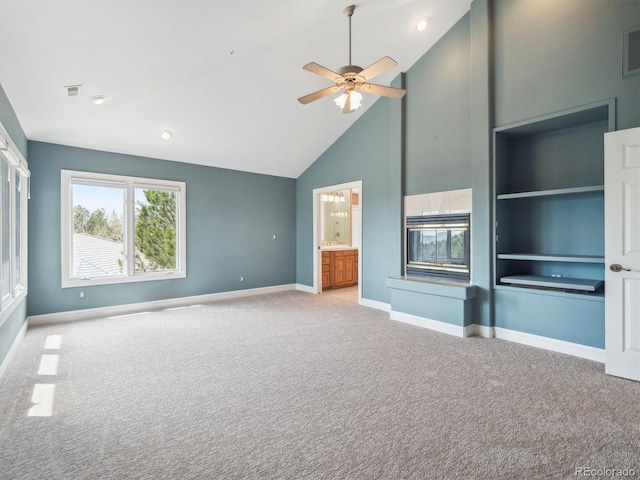 902 Anaconda Ct, Castle Rock, CO 80108 - unfurnished bedroom featuring multiple windows, light carpet, baseboards, and high vaulted ceiling