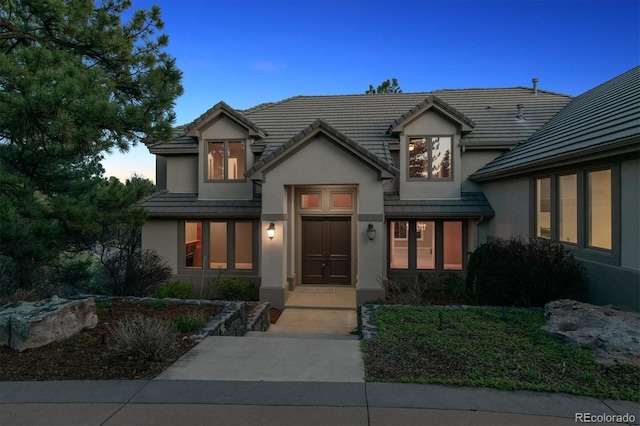 902 Anaconda Ct, Castle Rock, CO 80108 - view of front facade with stucco siding and a tile roof