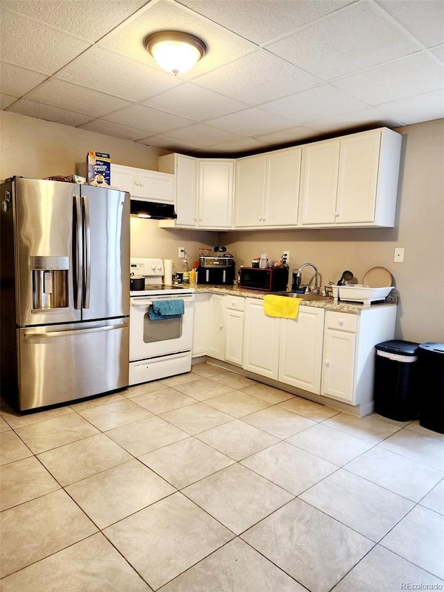 kitchen with stainless steel fridge with ice dispenser, white electric stove, a drop ceiling, and under cabinet range hood