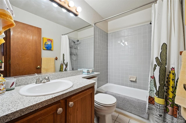 full bathroom featuring shower / bathtub combination with curtain, vanity, tile patterned floors, and toilet