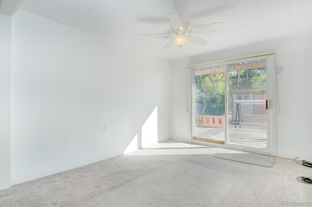 empty room with carpet floors and ceiling fan