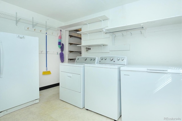 washroom featuring separate washer and dryer