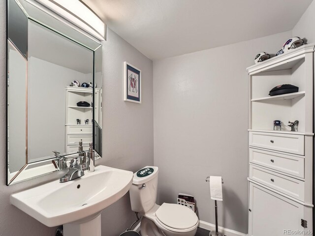 3691 Bucknell Dr, Highlands Ranch, CO 80129 - half bathroom with a sink and toilet