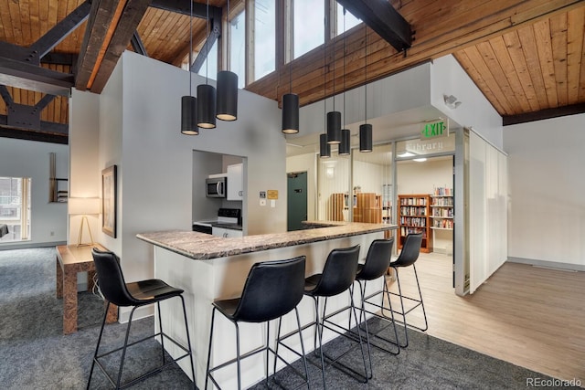 kitchen with beamed ceiling, white electric range oven, wood-type flooring, high vaulted ceiling, and wooden ceiling