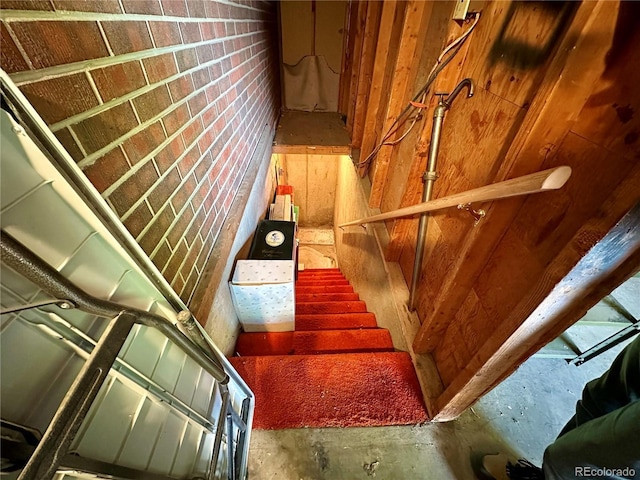 10425 Franklin Way, Northglenn, CO 80233 - stairs featuring concrete floors